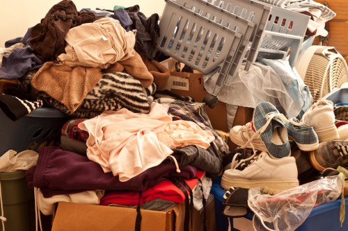 Workers managing builders waste clearance